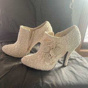 Beige colored lace booties